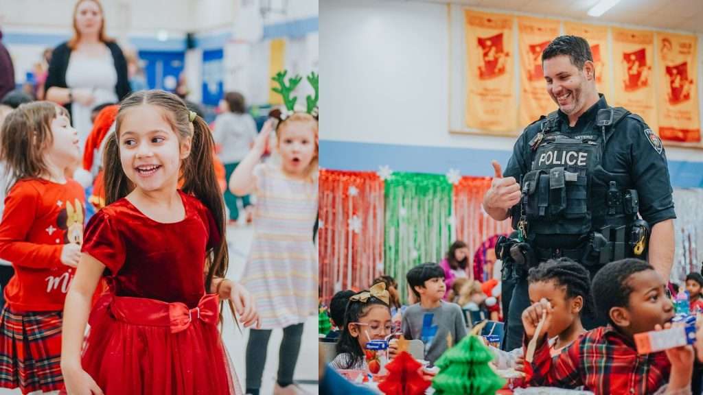 Children interacting with the Police officer at the Baby Jesus Lunch