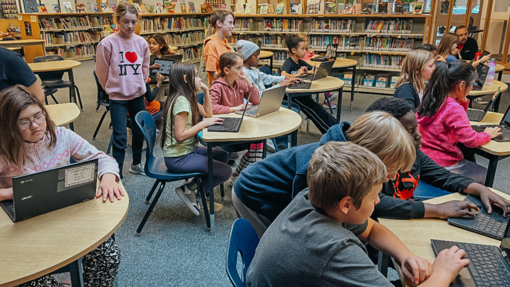 St. Anne's students in the library working on their computers