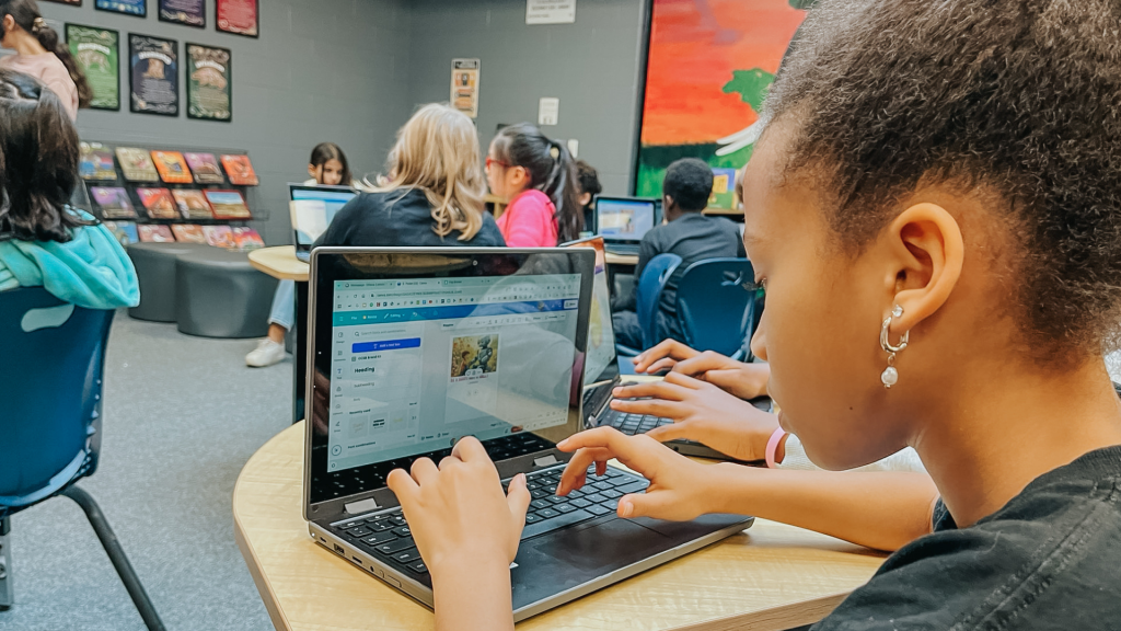 St. Anne's students in her computer