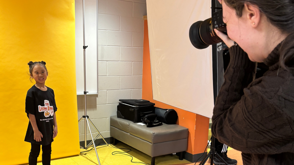 Student at a photography session getting ready for the play