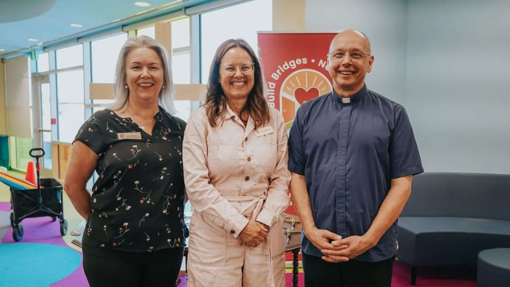 St Gianna School's team with Father John