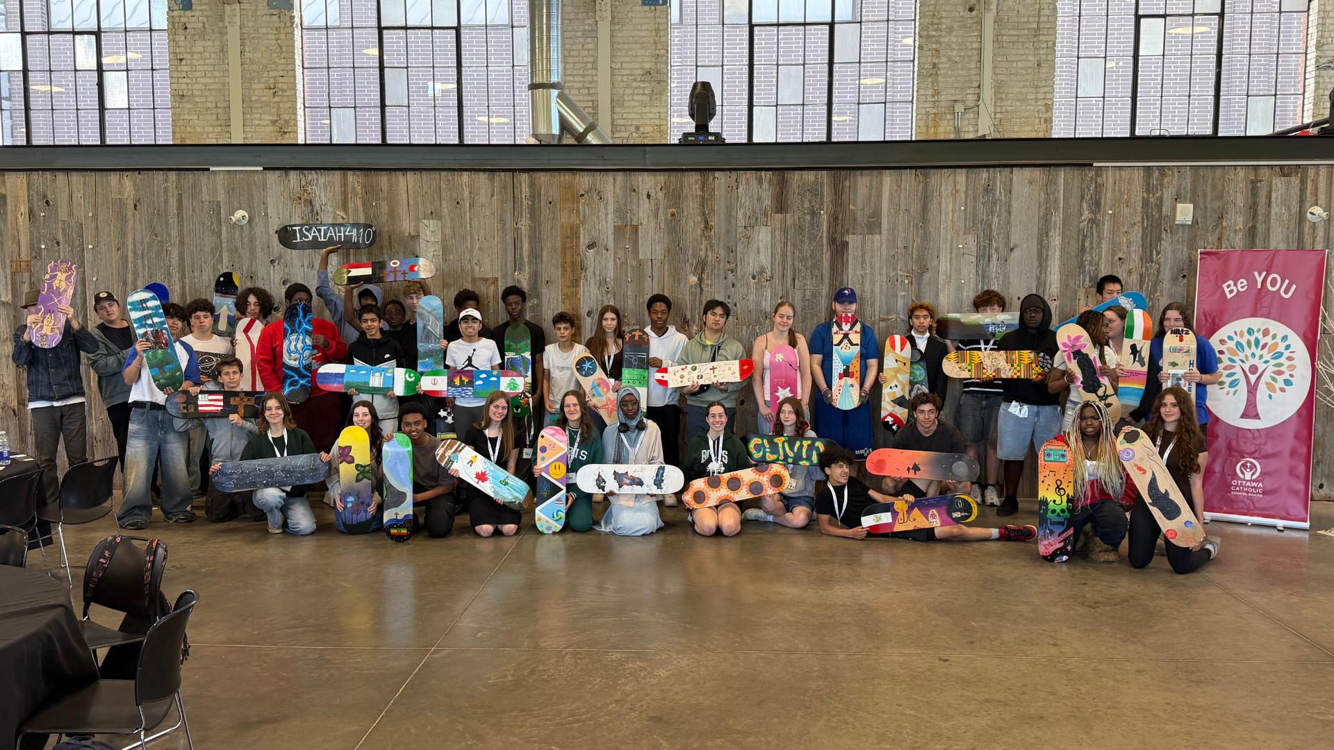 Be You Project artists with their artwork at the expo