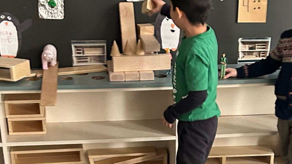 St. Monica's students working with the wooden blocks in their classroom