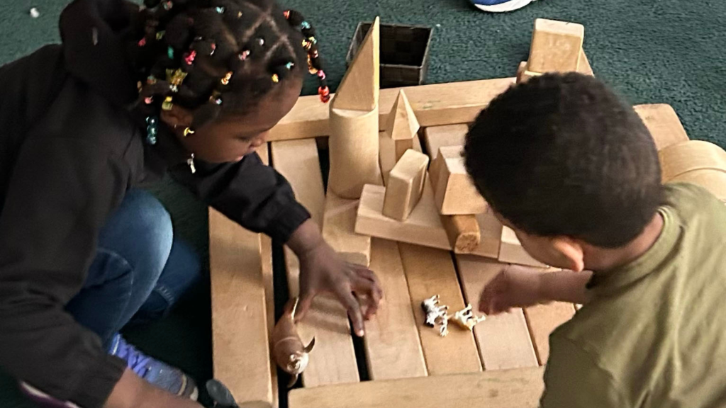 St. monica's students working with the wooden blocks