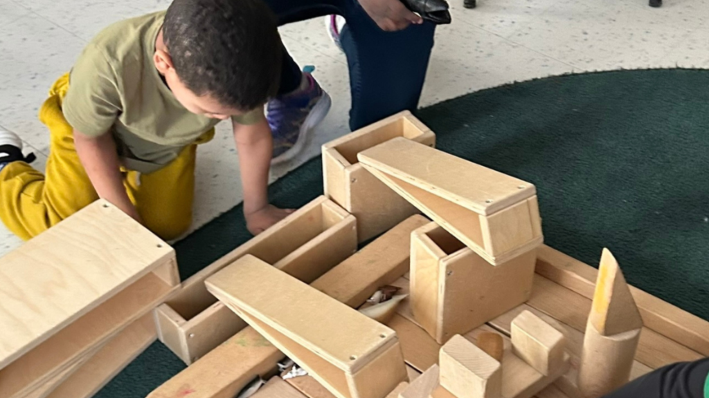St. monica's students working with the wooden blocks