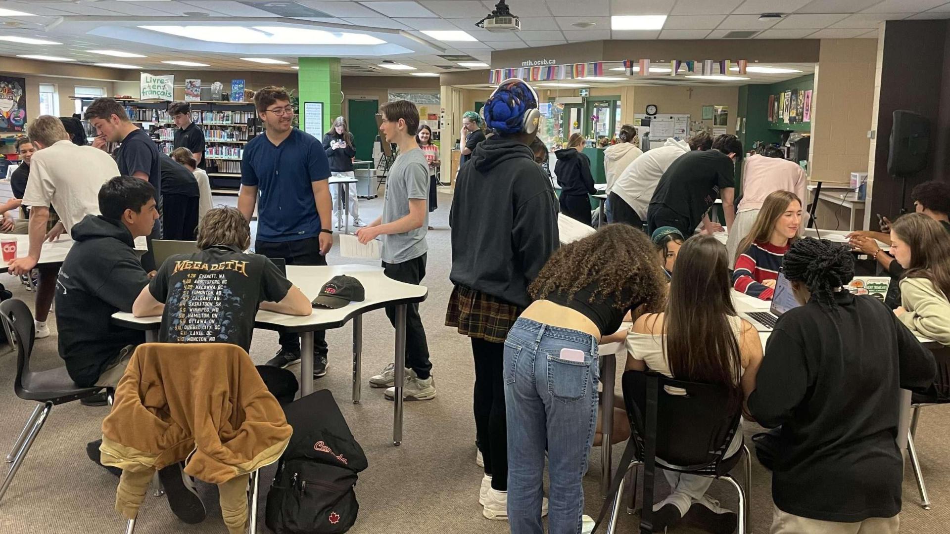 St. Mathew's Co-op students in their school working on their project