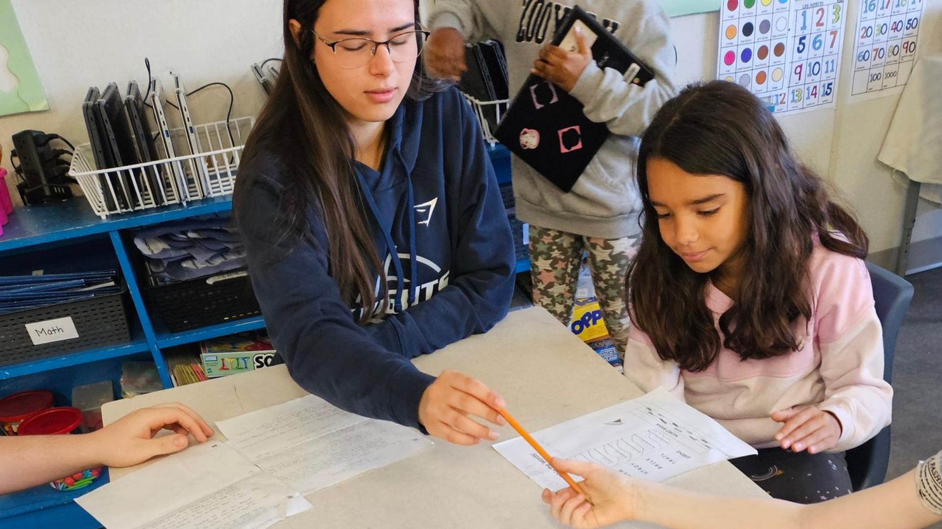 An older peer sharing about Faith values to the young ones