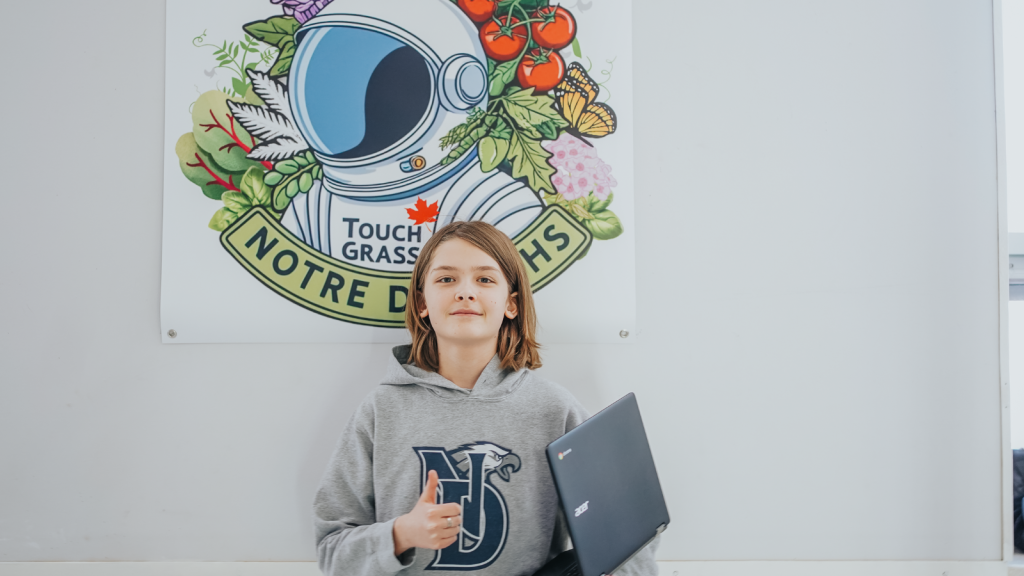 Notre Dame student with their computer