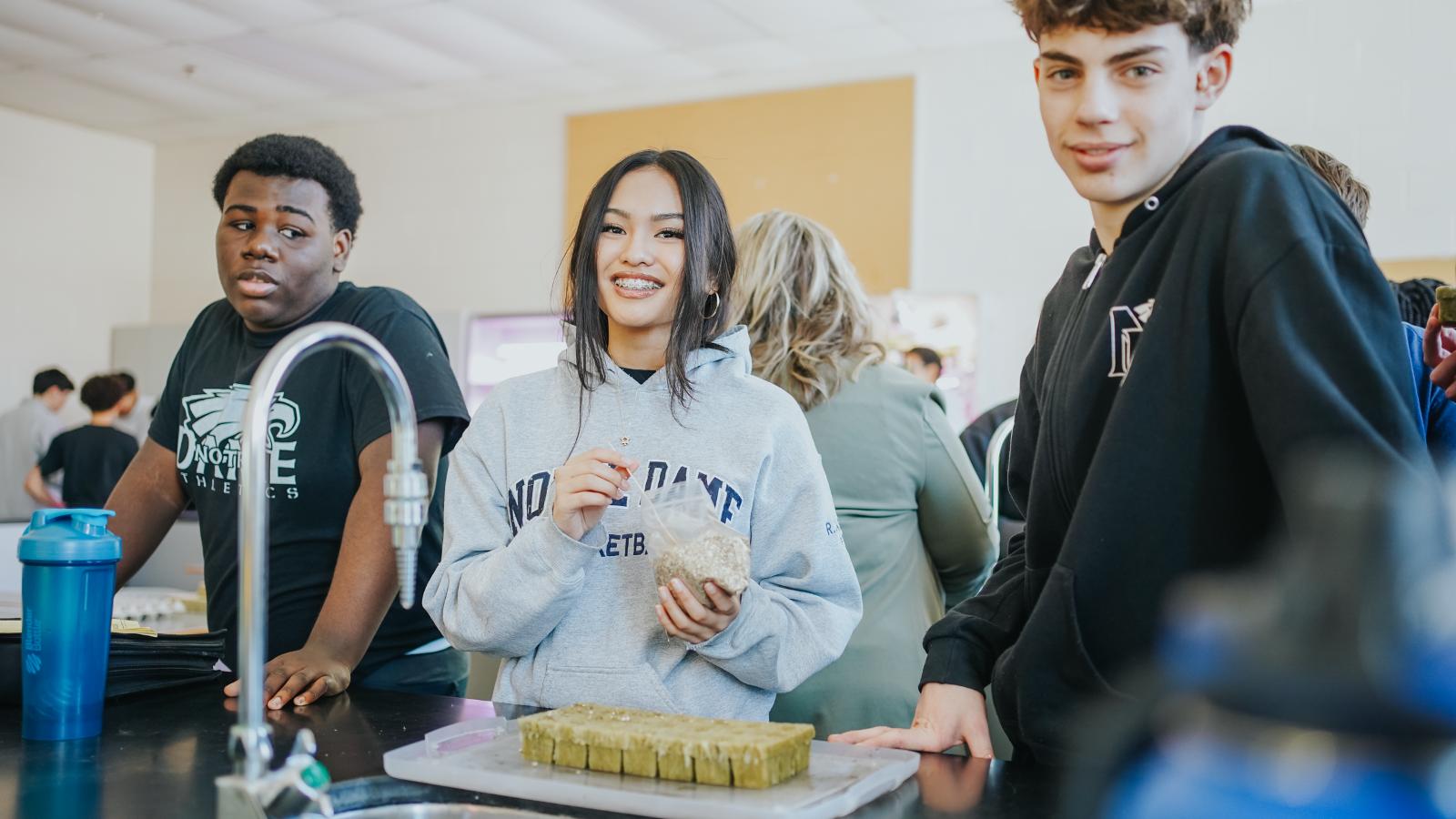 Notre Dame students working on their garden project
