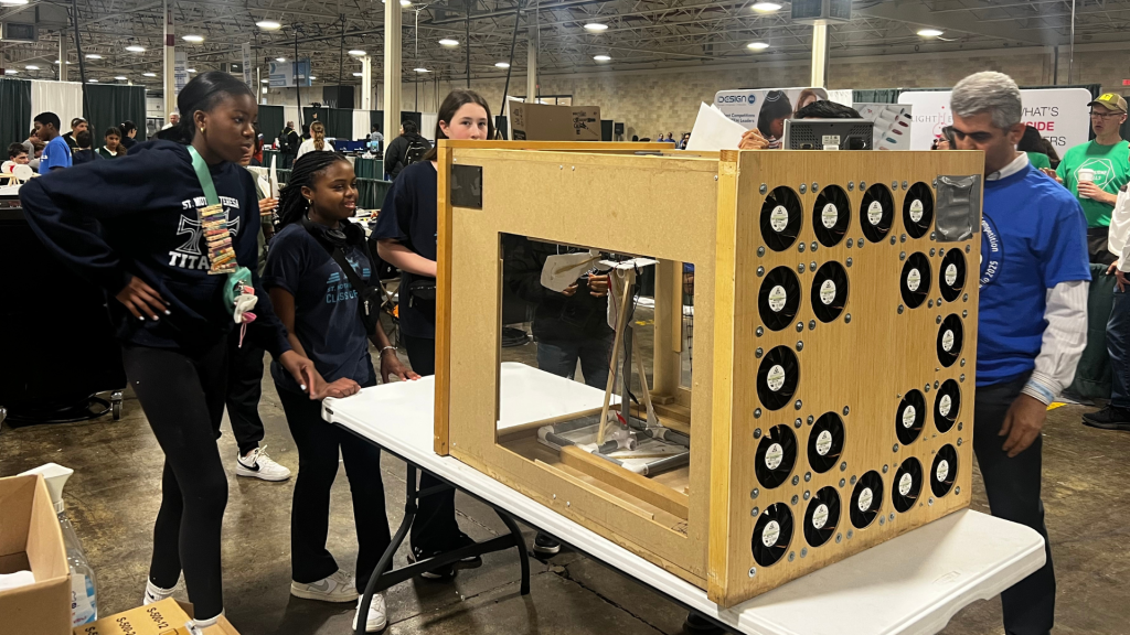 St. Mother Theresa's students showing their robotics project