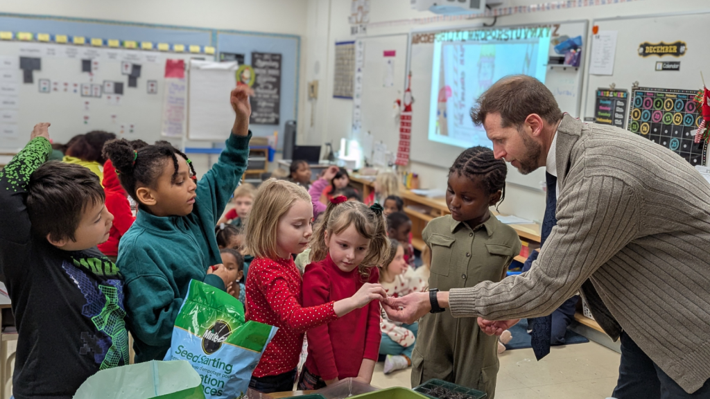 students in their classroom learning about seeds