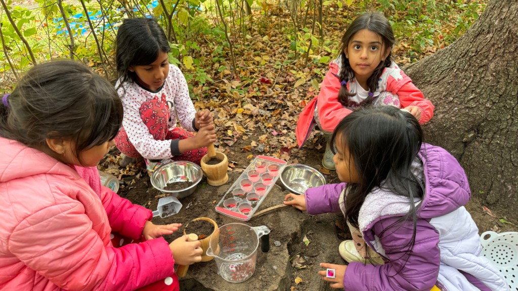 St. Monica's working with nature elements during their Forest School activity