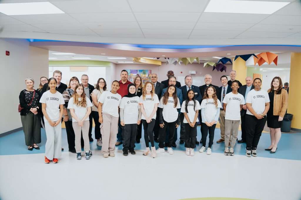 St. Veronica School staff, students and priests