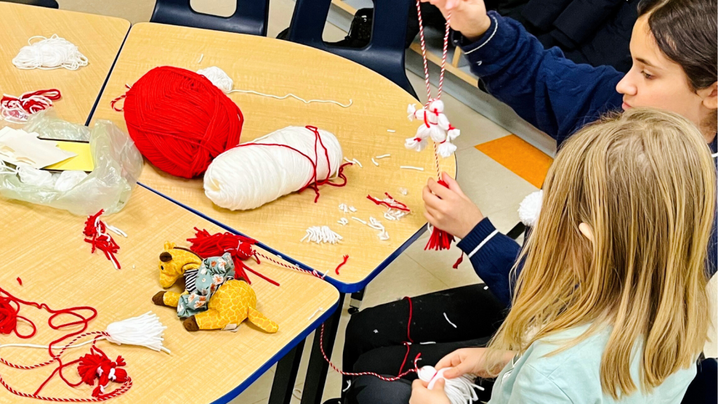 Language students working with craft in their classroom