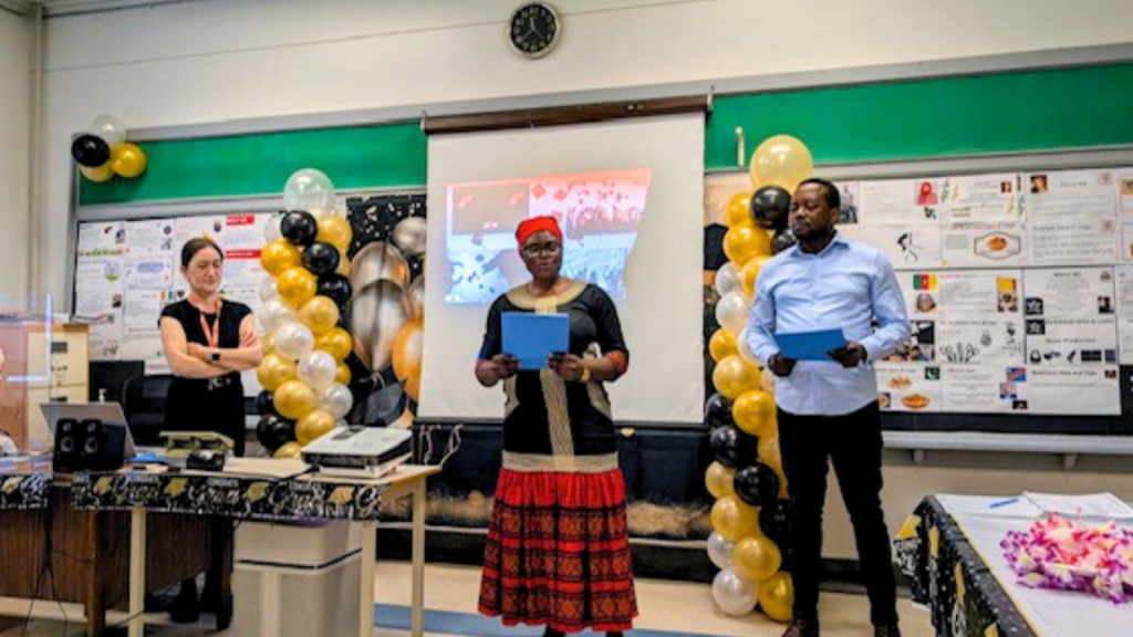 Adult learners presenting to the class