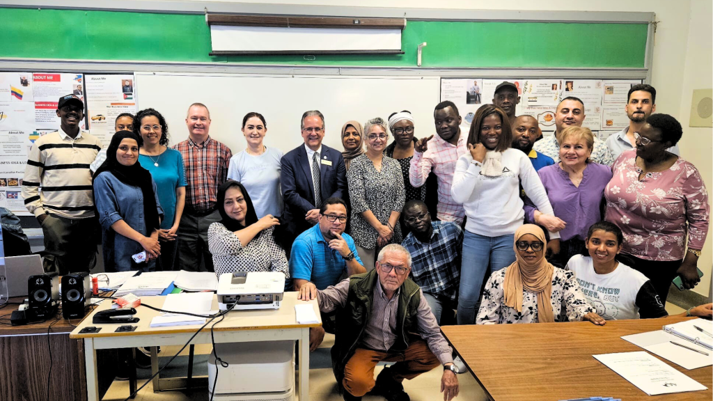Adult learners graduates in their classroom
