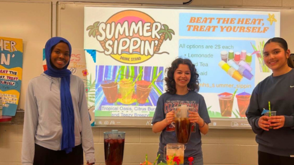 St. Mark's students showing their tropical mocktail business