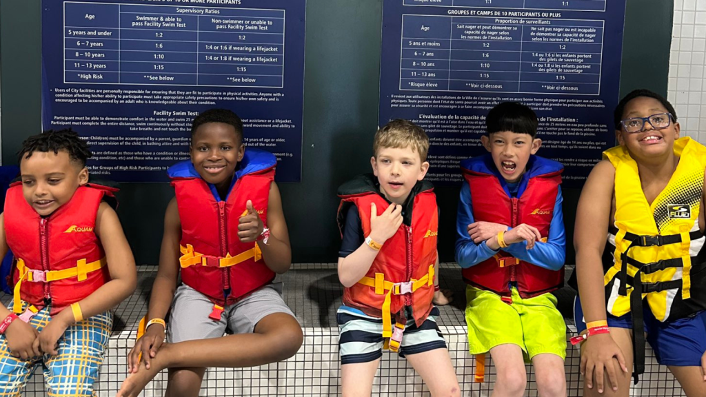 Students waiting for their turn to compete at the Annual Swim Meet