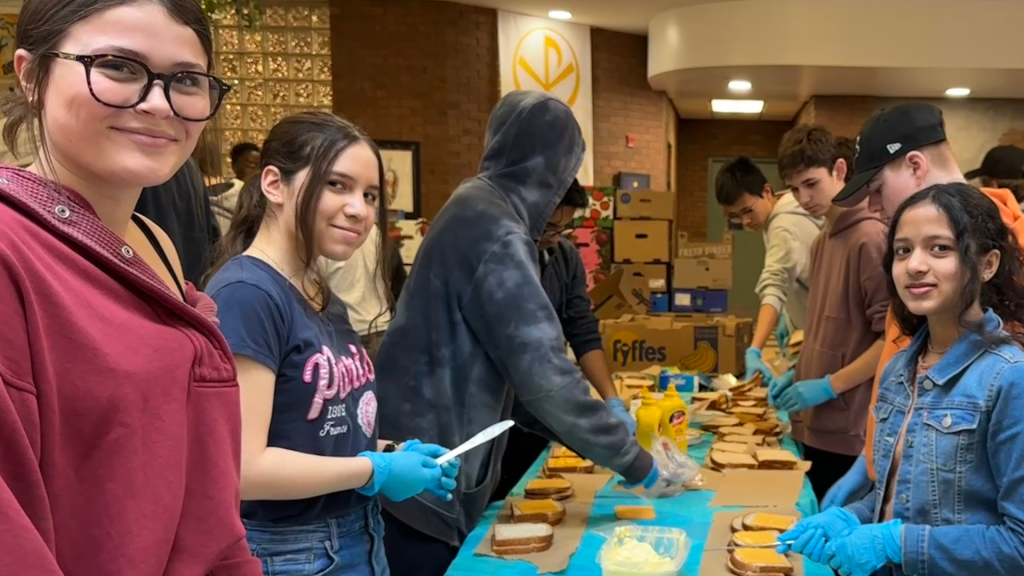 Students making sandwiches to donate
